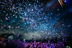 People celebrating with confetti falling around them